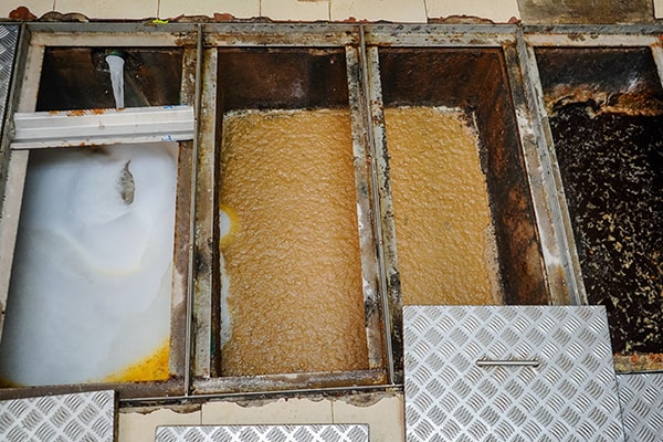 grease trap maintenance methods include pumping out the grease, scraping the walls, and inspecting for any issues